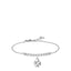 Silver-toned steel bracelet with a row of clear zircons and a polished four-leaf clover charm.