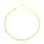 Gold-toned tennis bracelet with a continuous line of clear, faceted stones, a lobster clasp, and an adjustable chain extender