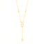 Gold-toned lariat necklace with a fine chain and five clear, brilliant-cut stones, including a central drop design.