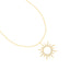 Gold-toned necklace with a sunburst pendant featuring an open centre and clear stone embellishments on its rays.