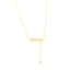 Gold-toned delicate chain necklace with a central cluster of clear star-shaped faceted stones and a drop chain with a single