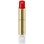 Red lipstick with gold casing on a white background.