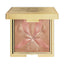 Sisley L'Orchidée face powder compact with a gold-toned case and an embossed floral design in bronze and pink shades.