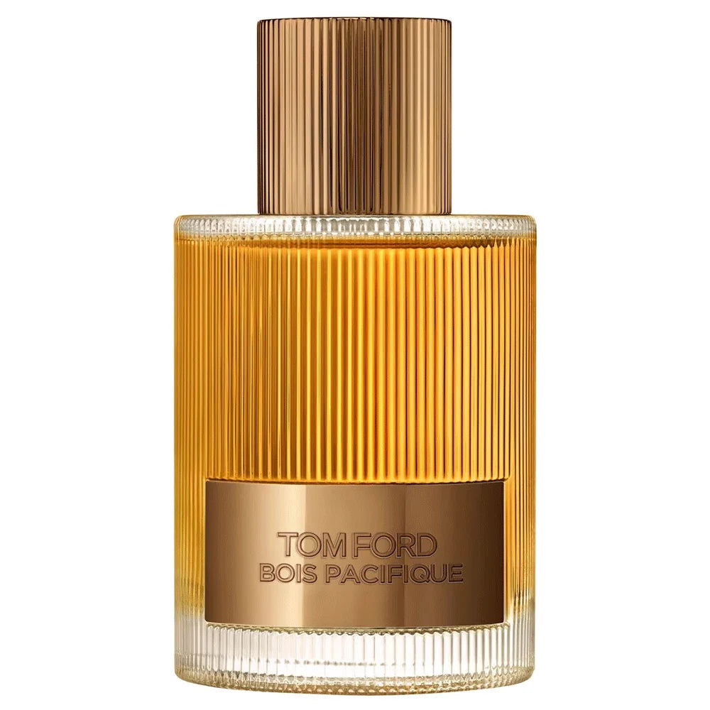 Tom Ford Signature Bois Pacifique EDP Spray in a clear and amber-toned ribbed glass bottle with a gold-toned metallic cap.