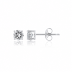 Pair of silver-toned stud earrings, each with a round, clear, brilliant-cut stone in a four-prong setting. One earring shows