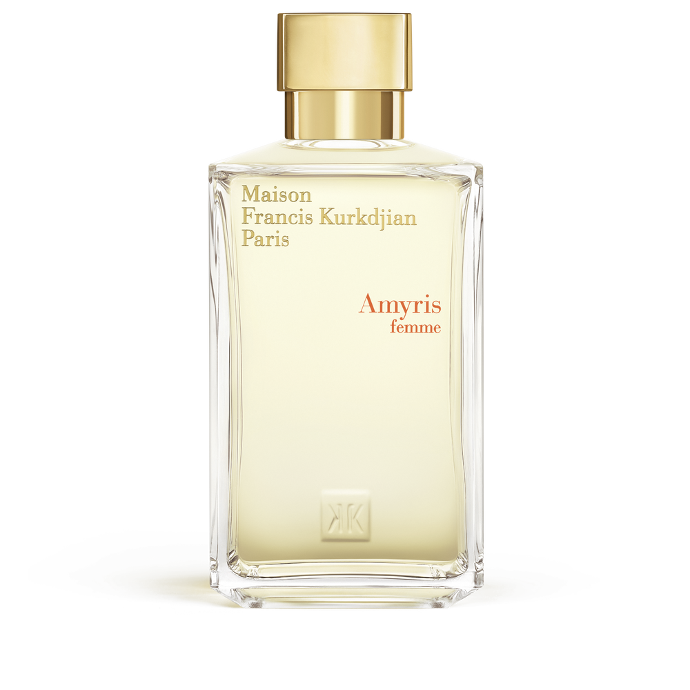 Clear rectangular glass perfume bottle with light yellow liquid and a gold-toned cap. Features 'Maison Francis Kurkdjian' tex