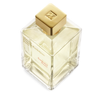 Clear square glass perfume bottle with light yellow liquid, a gold-toned square cap with an embossed logo, and black and red