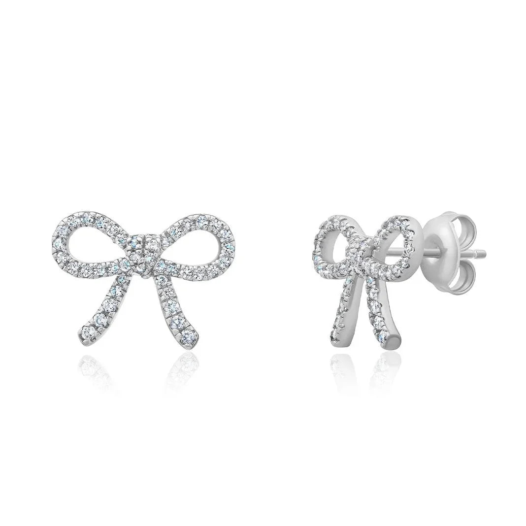 Pair of silver-toned bow stud earrings, each pavé-set with numerous clear cubic zirconia stones, with post-back closures.