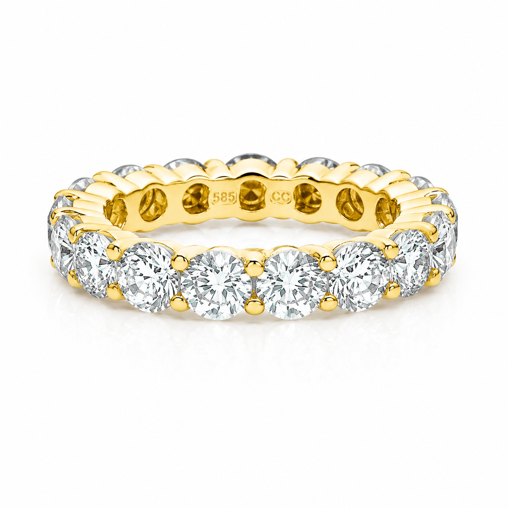 Gold-toned eternity ring with round, clear stones continuously set around the band, secured by small gold-toned prongs.
