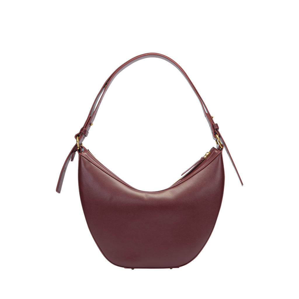 Orlandi Valentino Women's Wine Quilted Crescent Hand Bag