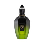Black to lime green ombre perfume bottle with a pointed black cap. Features a black label with a gold-toned bull logo and 'PE