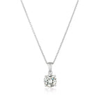 Silver-toned chain necklace with a single round, brilliant-cut clear stone pendant in a four-prong setting.
