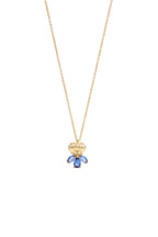 Gold-toned necklace with a textured dome pendant and a cluster of five blue marquise-cut faceted stones.