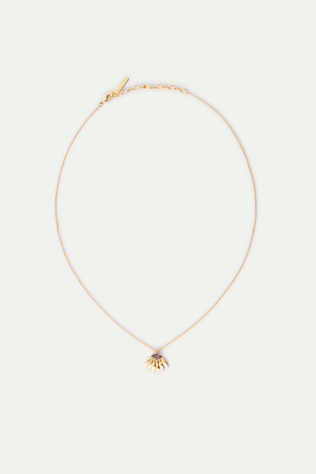 Gold-toned delicate chain necklace with a stylised gold-toned floral pendant featuring small white beads and a central purple