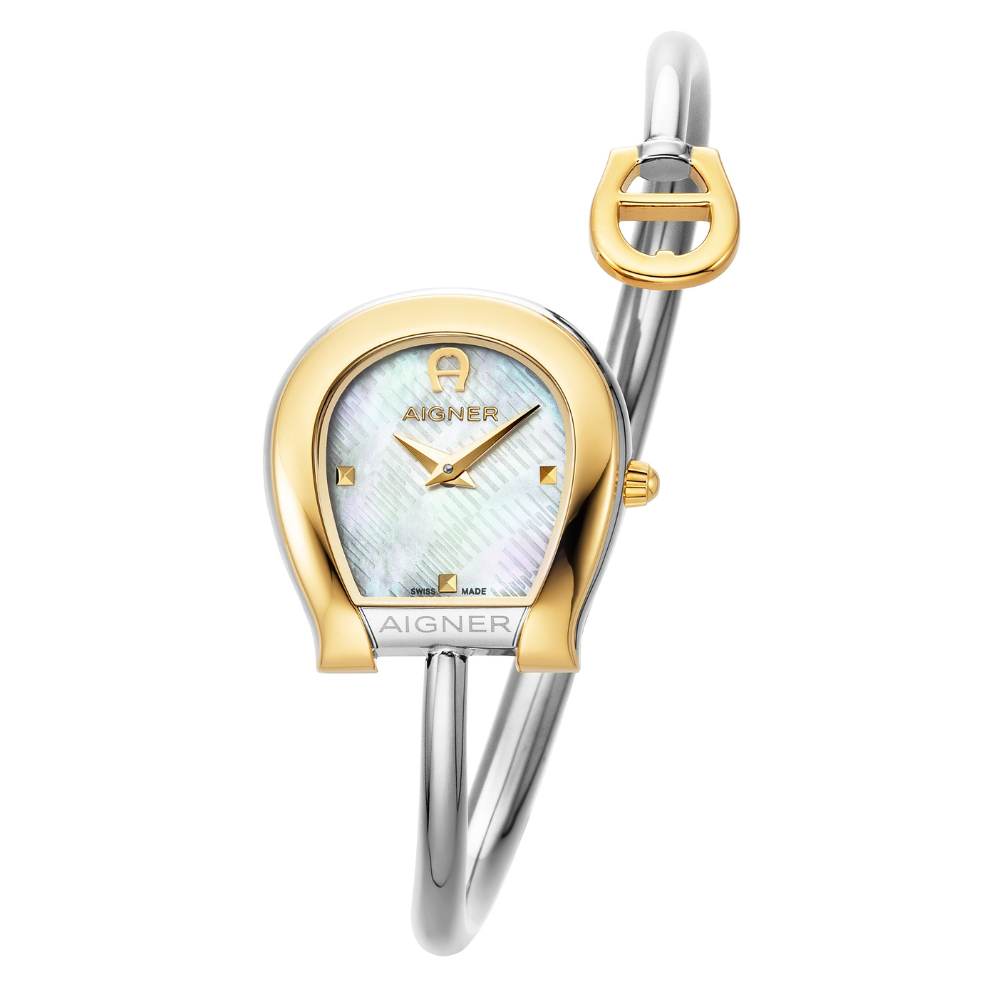 A direct studio front catalog portrait of the women's Aigner Flora L watch, highlighting its two-tone gold and silver horseshoe case, textured checkered white Mother of Pearl dial, and the wrapping tubular steel bangle with its contrast yellow gold horseshoe logo charm.