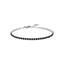 Silver-toned steel tennis bracelet with a continuous line of square-cut black zircons, featuring a lobster clasp and extender