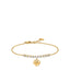 Gold-toned steel bracelet with a row of white zircons and a polished gold-toned heart charm, featuring a lobster clasp.