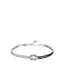 Silver-toned steel double-strand bracelet with a central knot, one side adorned with clear zircons and the other with black z