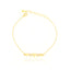 Gold-toned delicate chain bracelet with five heart charms, two of which are encrusted with clear stones, and a lobster clasp.