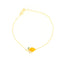 Gold-toned chain bracelet with a bright yellow lemon-shaped charm, featuring a green leaf and a segment embellished with clea