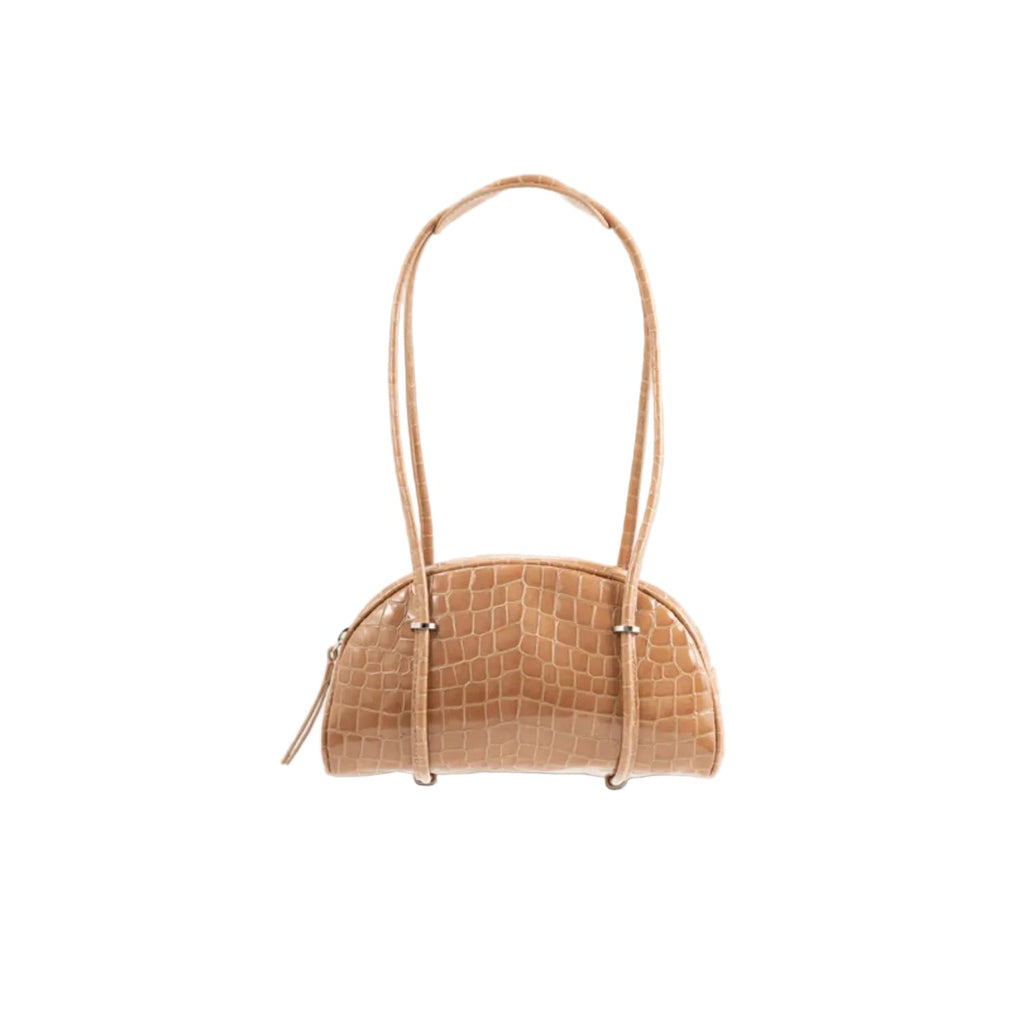 Front view of the BY FAR Kimberly Bowler shoulder bag in fresh green croco-embossed leather featuring a semi-circular body, two long tubular straps, and silver hardware accents.