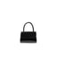 Front view of the BY FAR Mini 2.0 top handle bag in black semi-patent leather featuring a small structured body and a single curved handle against a light grey background.