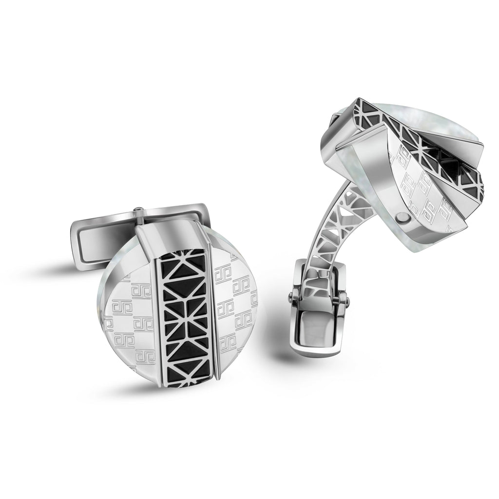 Silver-toned cufflinks with mother-of-pearl and black geometric. Round with square motifs; multi-faceted with openwork arm.