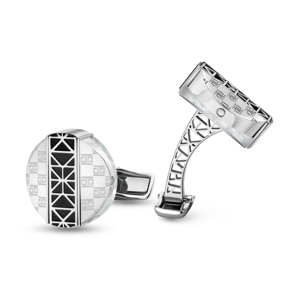 Silver-toned cufflinks with white MOP and geometric patterns. One round with black center, other rectangular with openwork ar