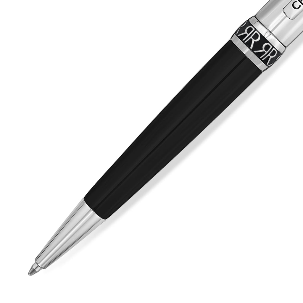 Black pen with a silver-toned conical tip and a silver-toned band featuring a repeating 'AR' pattern. A 'CR' detail is visibl