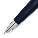 Dark blue pen with a textured body featuring diagonal lines and a silver-toned conical tip.