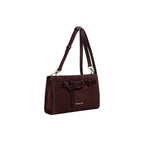 Burgundy suede shoulder bag with a smooth strap, front buckle, and gold-toned hardware.