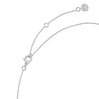 Silver-toned delicate link necklace with a lobster clasp, extender chain, and a small round clear stone in a bezel setting.