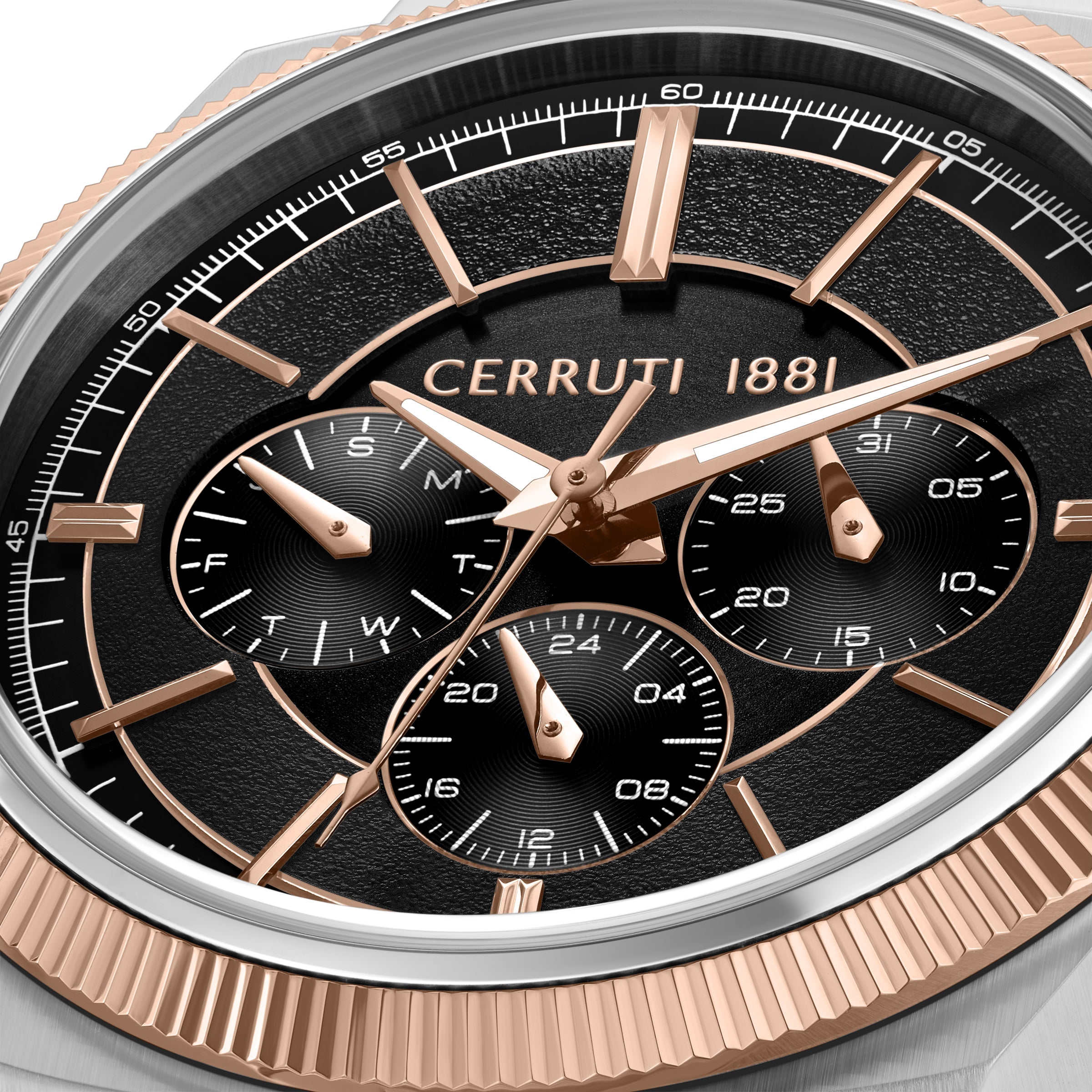 Silver-toned watch with a rose gold-toned fluted bezel and a black textured dial. Features gold-toned hands, hour markers, an