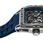 Silver-toned rectangular watch with blue accents, a dark blue textured dial, white hands, and a blue ribbed silicone strap.