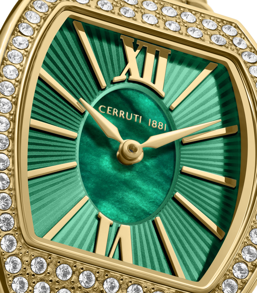 Gold-toned octagonal watch with crystal-encrusted bezel. Green dial with marbled center, striped outer ring, gold-toned hands