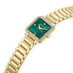 Gold-toned watch with a rectangular case, crystal-encrusted bezel, and a deep green mother-of-pearl dial with gold-toned hand