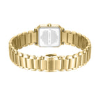 Gold-toned square watch with a brushed metal link bracelet, seen from the back. The stainless steel case back has engraved te