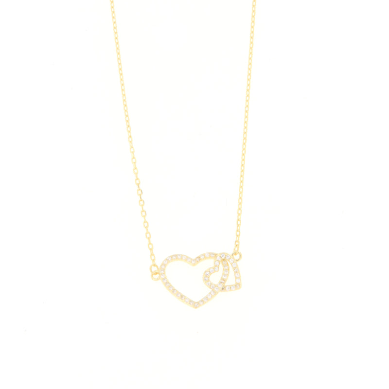 Gold-toned delicate chain necklace with two interlocking heart pendants, both embellished with clear crystals.