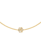 Gold-toned long chain necklace with a white mother of pearl flower pendant featuring a gold-toned interlocking letter logo.