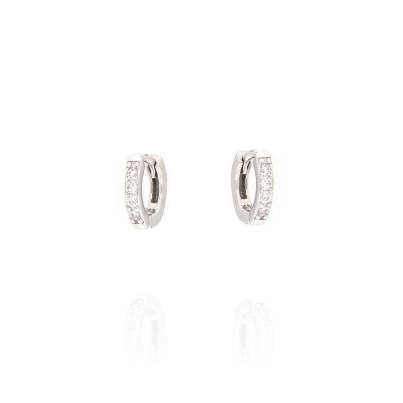 Pair of small silver-toned micro hoop earrings, each embellished with a row of clear, round-cut stones.