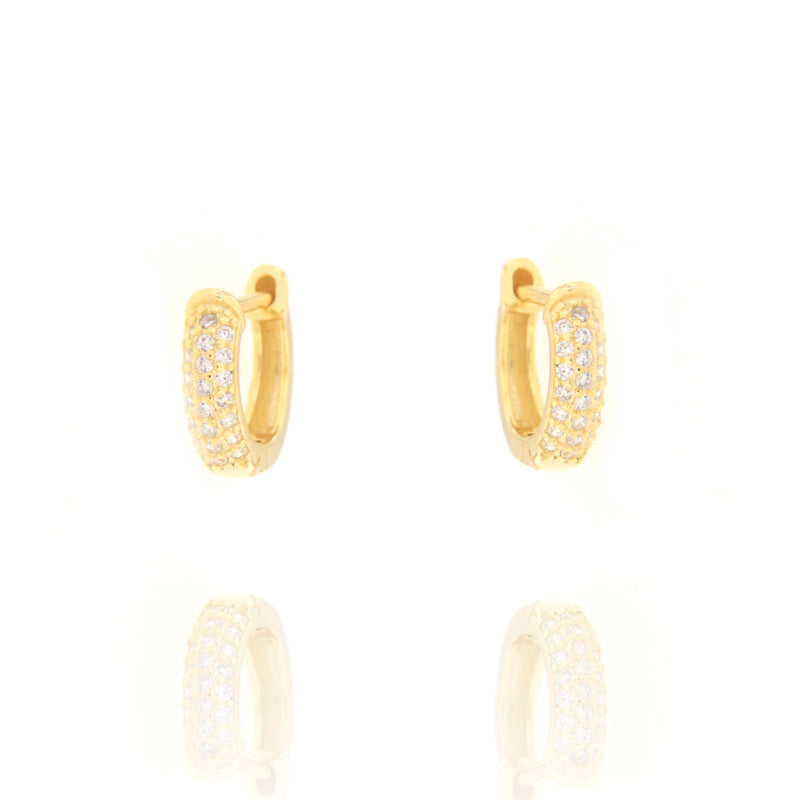Pair of small gold-toned oval hoop earrings with three rows of clear pavé-set stones on the front.