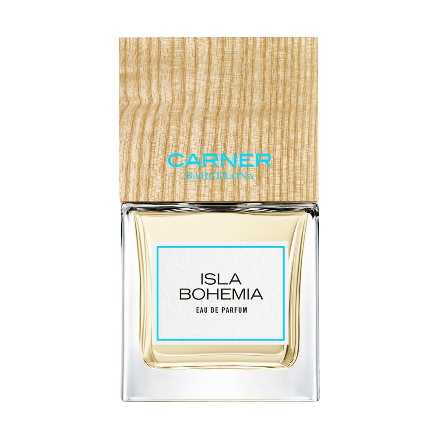 Carner Barcelona Isla Bohemia 100ml perfume bottle topped with its signature square wooden cap, presented next to a clean white retail box featuring minimalist black text. Main image