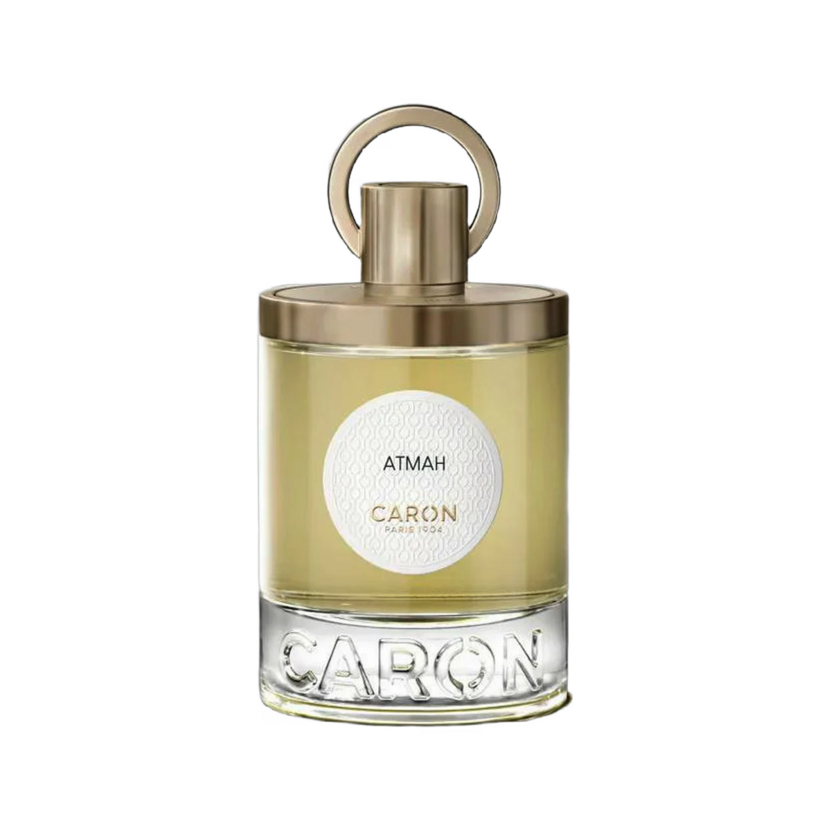 Front view of Caron Atmah Eau De Parfum 100ml unisex perfume featuring transparent cylindrical glass bottle, golden-yellow fragrance, champagne-gold cap with circular ring and white Caron Paris label