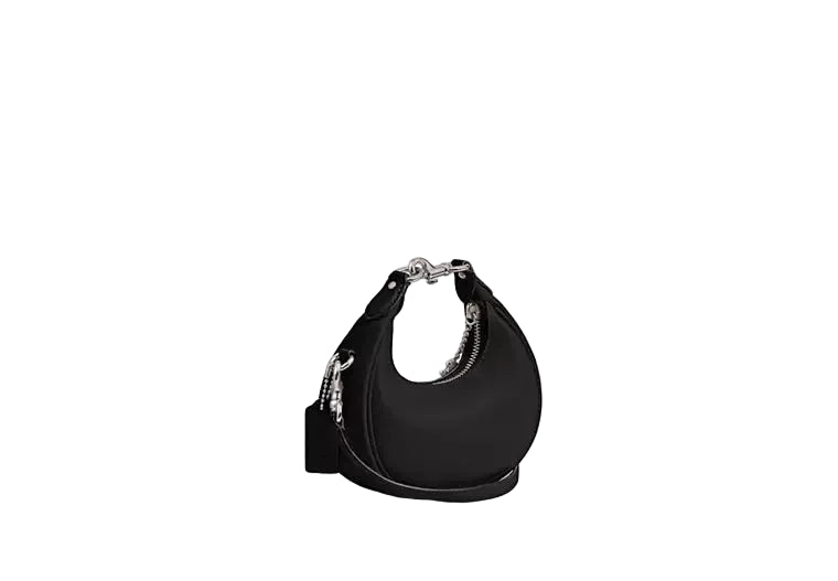 Coach Jonie women black leather mini handbag curved design luxury style Shop Now Online Paris Gallery Qatar