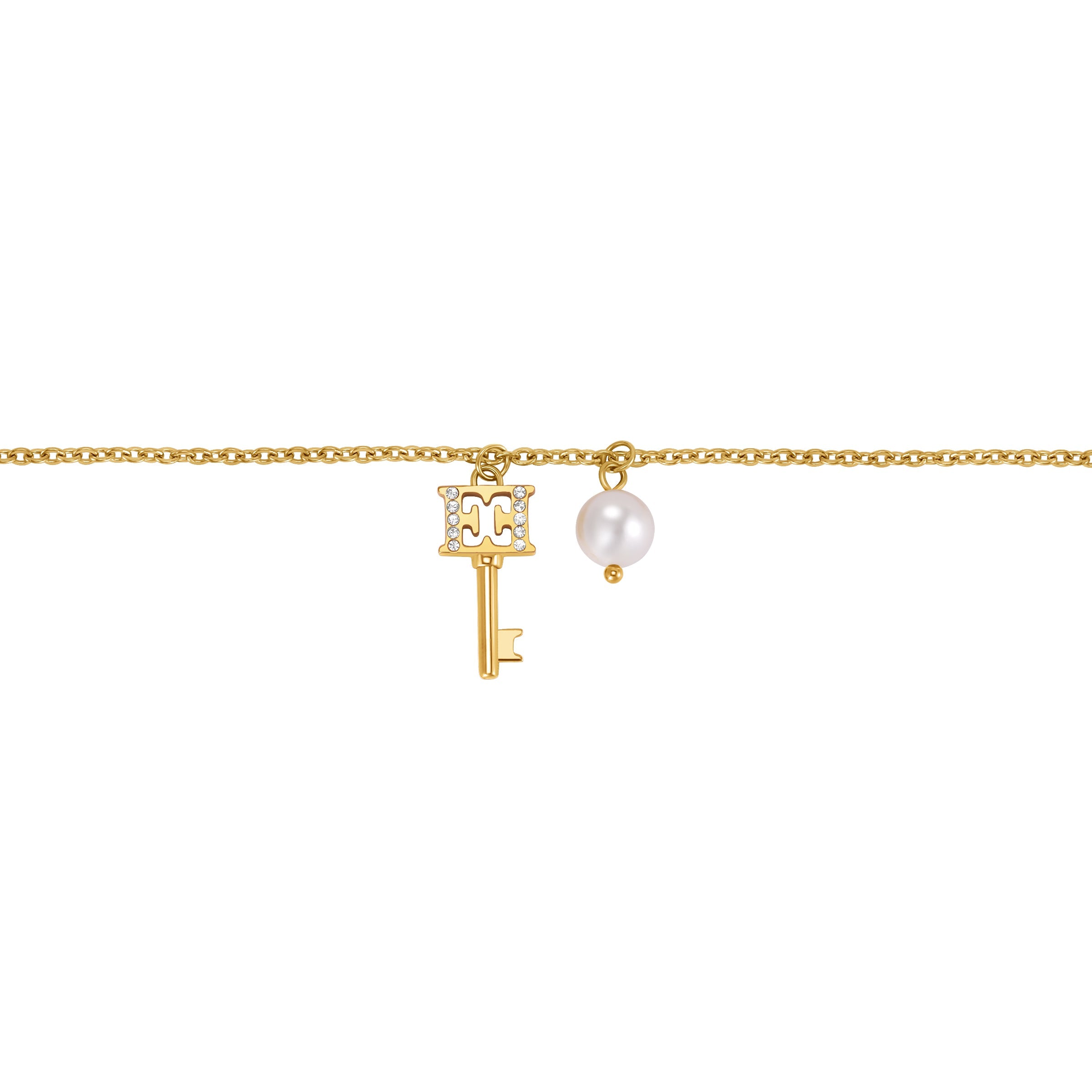 Gold-toned chain bracelet with a key charm featuring a crystal-encrusted 'CC' bow and a white pearl charm.