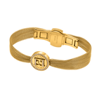 Gold-toned mesh bracelet with a round central charm featuring the ESCADA 'E' logo and clear stone embellishments.