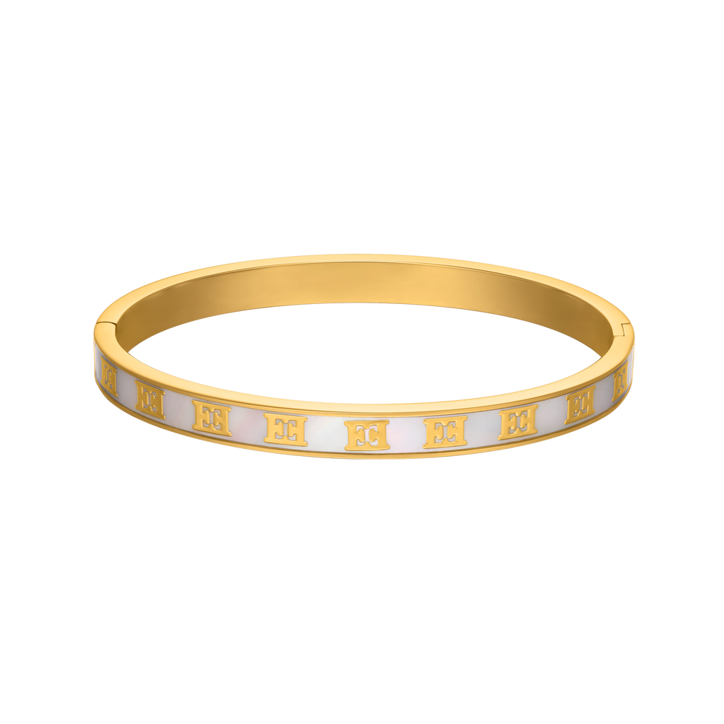 Gold-toned bangle bracelet with white iridescent Mother of Pearl inlay and gold-toned Escada monograms.
