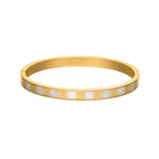 Gold-toned bangle bracelet with white iridescent Mother of Pearl inlay and gold-toned Escada monograms.