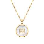 ESCADA CAROLINE ROUND MOP MOTIF WITH ESCADA LOGO NACKLACE