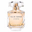 Front view of the Elie Saab Le Parfum Eau de Parfum 90ml bottle against a plain white background. The bottle is crafted from clear, heavy faceted glass resembling a cut gemstone, revealing the peach-colored liquid inside. It features a transparent, geometric crystal-like cap with a gold dispenser underneath, and 'ELIE SAAB LE PARFUM EAU DE PARFUM' printed in black lettering across the front.